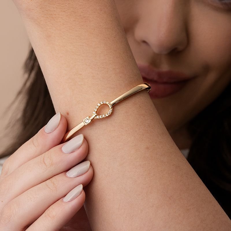 BRACELETE DOURADO GOTA PONTO LUZ COM PEDRAS CRAVEJADAS