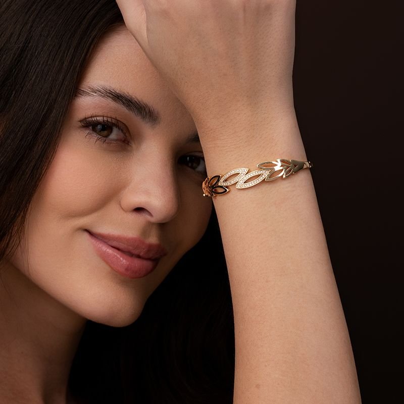 BRACELETE FOLHAS BANHADO EM OURO 18K CRAVEJADO COM PEDRAS
