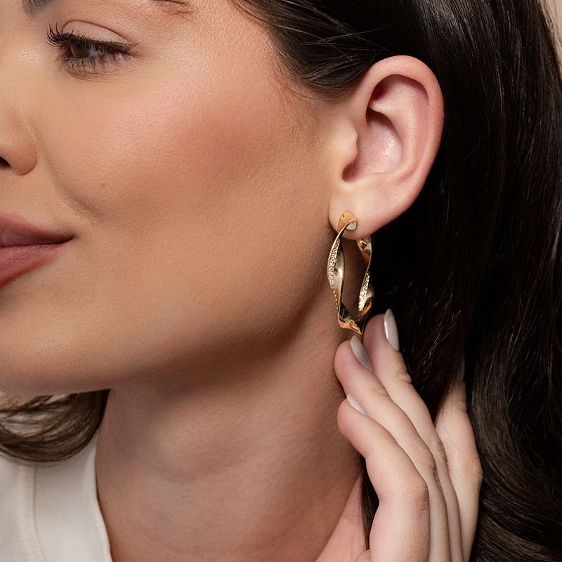 BRINCO TORCIDO BANHADO EM OURO 18K C/ ZIRCÔNIAS